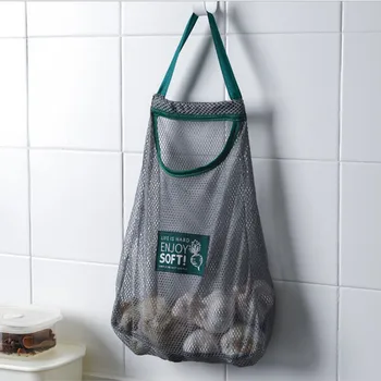 Virtuvės daržovių ju saugojimo krepšys tuščiaviduriai kvėpuojantis virtuvės česnakai, imbieras ju laikymo maišą svogūnų bulvių laikymo kabo krepšys